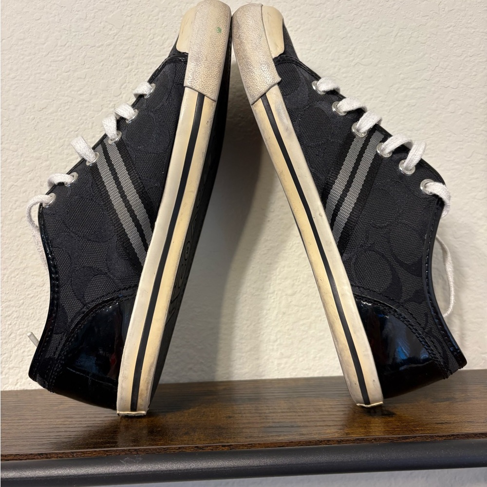 Coach “Folly” black white signature Jacquard low sneakers. Size 7.5B. Preowned.